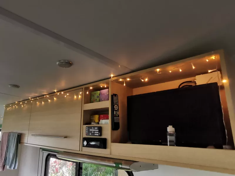 Make your christmas in a van more festive by decorating with lights!
