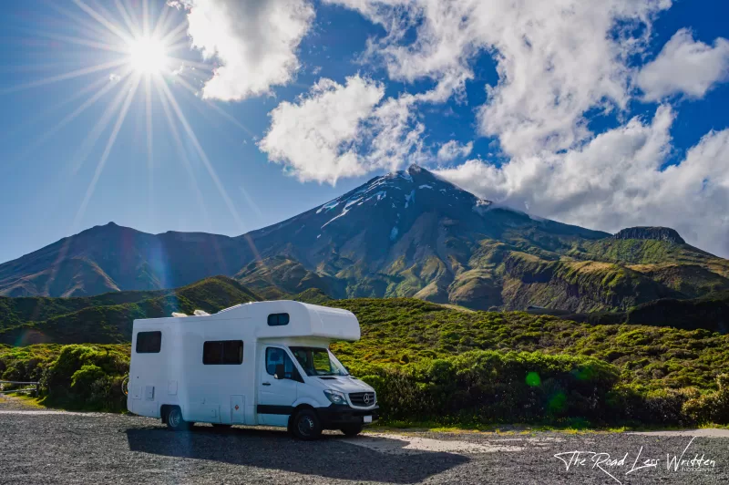 Our motorhome overlooking Mt Taranaki. Campervans are a great way to do eco-conscious travel